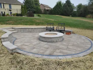 Custom patio and fire pit by Green Expectations